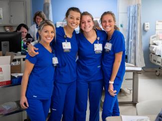 A group photo of nursing students during a clinical course. 