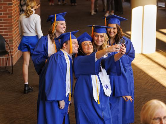 Graduates taking selfie together at pinning ceremony