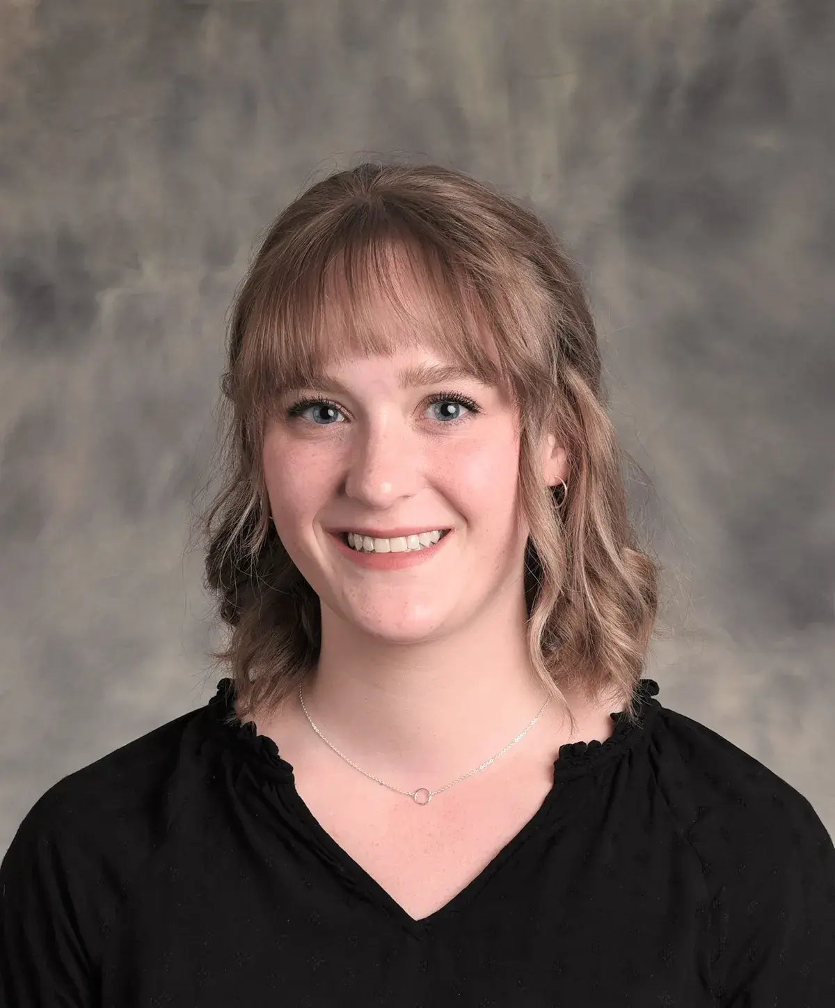 headshot photo of Natalie Thomson 